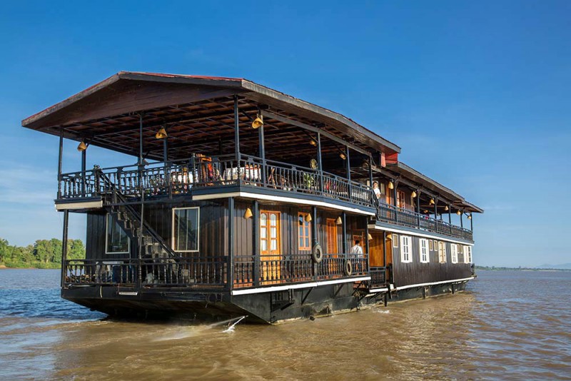 The Vat Phou boat, a floating hotel cruising on the Mekong River, Southern Laos